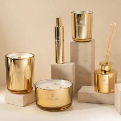 Bougie parfumée 80H dans pot en verre doré 11x11x14.5 cm