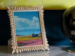 Cadre en résine dorée avec pétales 28,4x2x33,5 cm