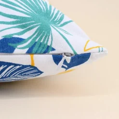 Coussin en tissu blanc motifs tropical 40x40cm