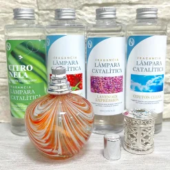 Lampe Catalytique Orange Waves (100ml). Assainit l'environnement et élimine mauvaises odeurs et impuretés de air sans les masquer
