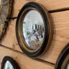 Petit miroir convexe noir doré 19cm