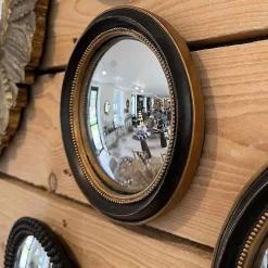 Petit miroir convexe noir doré 19cm