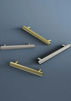 Poignée de meuble arrondi GoodHome Garlan aluminium effet laiton satin doré l.136mm x l.15mm x H. 27mm entraxe 96mm