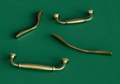 Poignée de meuble nœud GoodHome Ruis effet laiton doré l.148mm x l.20mm x H. 38mm entraxe 128mm