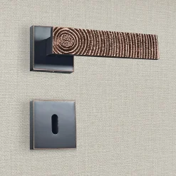 Poignée de porte design à clé finition aspect cuivre patiné noir Luna - KATCHMEE