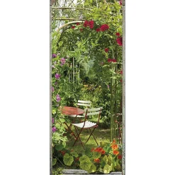Sticker mural décoratif 204 cm X 83 cm, trompe l'oeil fleuri avec arche de capucine et rose trémière autour d'une table de jardin.