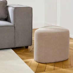 tabouret. pouf en forme de galet en tissu greige. TAO L 60 x P 44 x H 40cm
