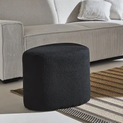 tabouret. pouf en forme de galet en tissu noir. TAO L 60 x P 44 x H 40cm