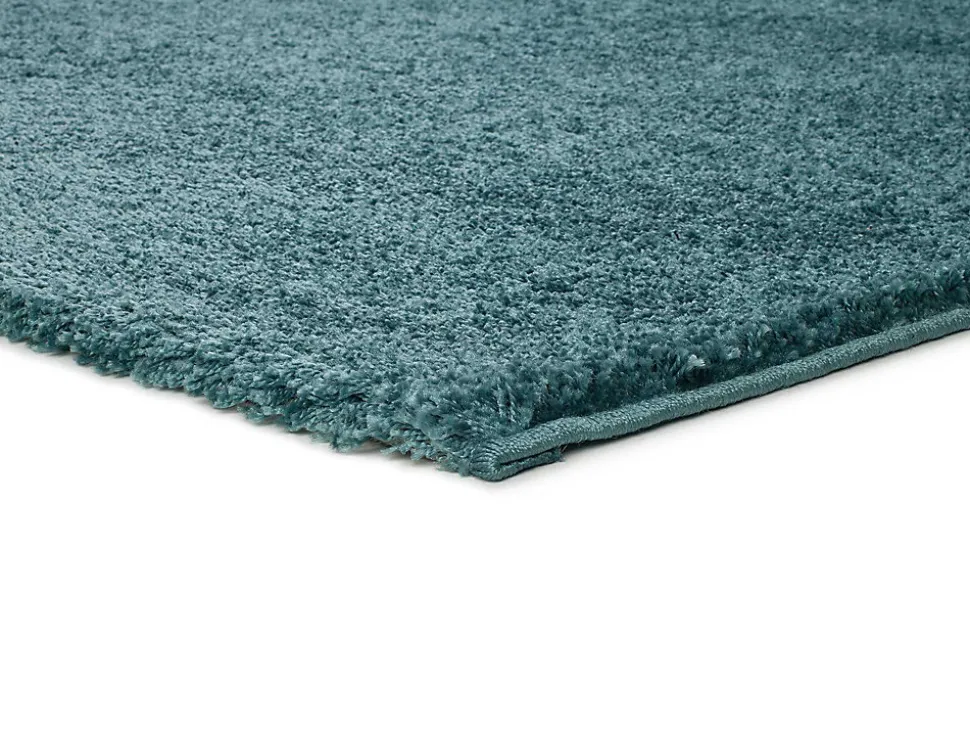 Tapis intérieur ATTICGO bleu rectangulaire shaggy uni 60x120 cm ATLAS