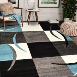 Tapis pour une chambre ou une entrée tissé motif géométrique VIRGULADA, bleu