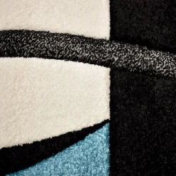 Tapis pour une chambre ou une entrée tissé motif géométrique VIRGULADA, bleu