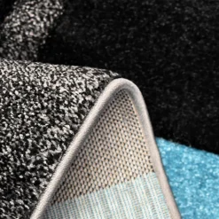 Tapis pour une chambre ou une entrée tissé motif géométrique DIAVIRGULE, bleu