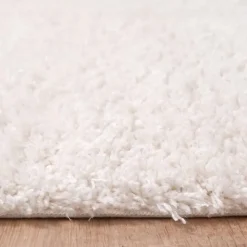 Tapis shaggy tissé motif uni LYN4 UNILA, crème