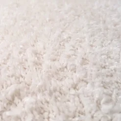 Tapis shaggy tissé motif uni LYN4 UNILA, crème