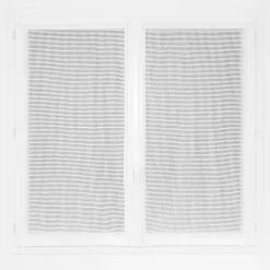 Vitrage tamisant filet passe-tringle finition ourlet blanc H.90 x l.45cm Rocle